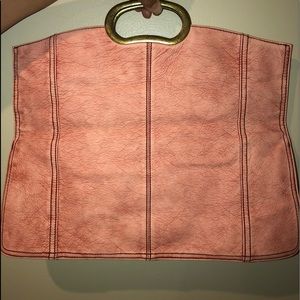 pink leather handbag